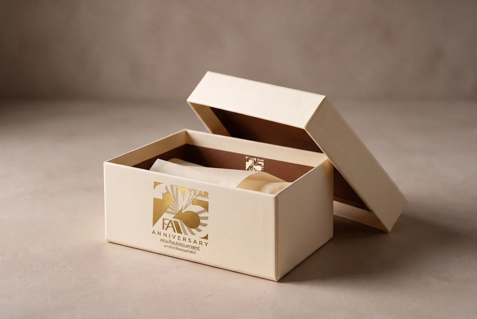Gift box — the mark foiled on the lid, the counter of the 5 repeated inside as a closure seal.